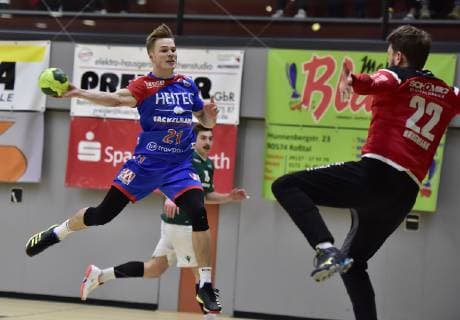 26 01 2019 Handball Season 2018 2019 Test match Friendship match HC Erlangen HCE Rimpar Wolves OGo Christopher Bissel 21 HC Erlangen HCE Max Brustmann 22 DJK Rimpar Wolves