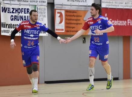 26 01 2019 Handball Season 2018 2019 Test match Friendship match HC Erlangen HCE Rimpar Wolves OGo Martin Murawski 24 HC Erlangen HCE Dominik Mappes 22 HC Erlangen HCE clap together