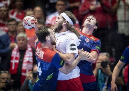 Mikkel Hansen1 of Denmark between Sander Sagosen and Christian O Sullivan of Norway during the men s IHF Handball World Championship finale between Denmark Norway in Herning Denmark on Sunday Jan 27 2019 Herning Denmark,  Copyright: Scanpix LiselottexSabroex COP102 spdk20190127-182849-L