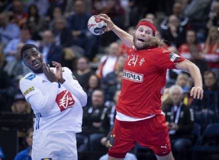 Mikkel Hansen of Denmark and Dika Mem of France during the men s IHF Handball World Championship semifinal between Denmark France in Hamburg Germany on Friday Jan 25 2019 Hamburg,  Copyright: Scanpix LiselottexSabroex cop301 spdk20190128-092043-L