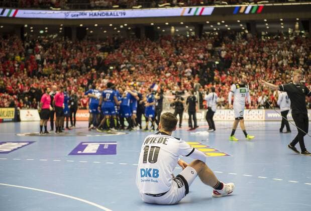 Fabian WIEDE GER disappointed after the back match the team of FRA celebrates match for 3rd place Germany GER France FRA on 27 01 2019 in Herning Denmark Handball World Championship 2019 from 10 01 27 01 2019 in Germany Denmark