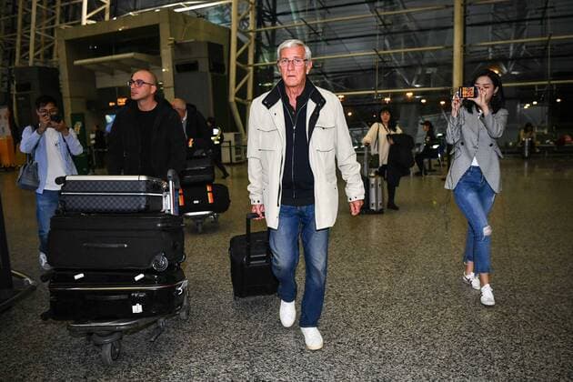 Italian football manager Marcello Lippi, the former head coach of the Chinese national men s football team, arrives at the Guangzhou Baiyun International Airport before departure in Guangzhou city, south China s Guangdong province, 29 January 2019. Marcello Lippi says goodbye to China after contract ends  20190129_53930