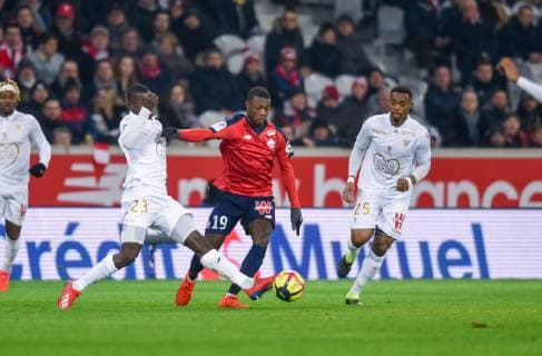 Nicolas Pepe ( LOSC ) - Malang Sarr ( Nice ) FOOTBALL : Lille OSC vs OGC Nice - Ligue 1 - Lille - 01 02 2019 FedericoPestellini Panoramic 