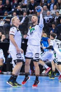 Stuttgart Germany 01 February 2019 All Star Game 2019 Germany vs All Star Team v li Patrick Wiencek Germany THW Kiel Fabian Wiede Germany Fuechse Berlin Stuttgart Porsche Arena Baden Württemberg Germany