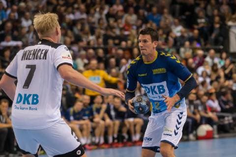 Stuttgart Germany 01 02 2019 All Star Game 2019 Handball Patrick Wiencek GER and Andy Schmid Allstar in the duel DeFodi541