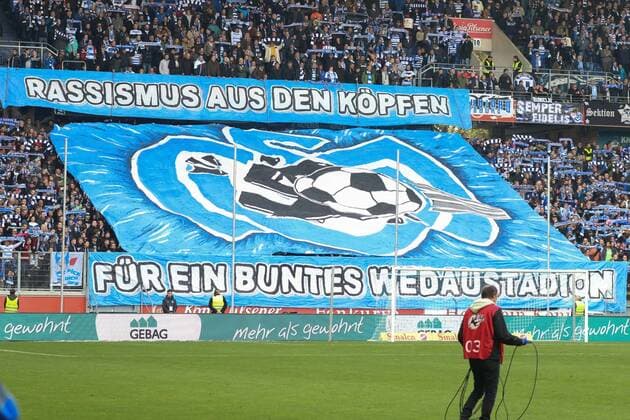 Giant MSV Duisburg Fan Banner Racism from the heads For a colourful Wedaustadion Football 3 League MSV Duisburg vs FC Hansa Rostock Duisburg Schauinsland Reisen Arena 22 10 2016 Duisburg Schauinsland Reisen Arena NRW Deutschland