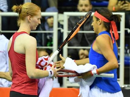 Belgian Alison Van Uytvanck reacts at a tennis match between Belgian Alison Van Uytvanck and French Caroline Garcia, the first rubber of the Fed Cup tennis meeting between Belgium and France, the quarter-finals of the World Group, Saturday 09 February 2019 in Liege. BENOITxDOPPAGNE  x05526934x