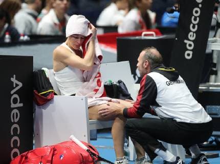 Andrea Petkovic GER cries on the right Team captain Jens Gerlach GER