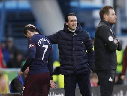 Henrikh Mkhitaryan of Arsenal substituted by Unai Emery manager of Arsenal during the Premier League match at the John Smith s Stadium, Huddersfield. Picture date: 9th February 2019. Picture credit should read: Darren Staples Sportimage EDITORIAL USE ONLY. No use with unauthorised audio, video, data, fixture lists, club league logos or live services. Online in-match use limited to 120 images, no video emulation. No use in betting, games or single club league player publications. SPI_034_DS_Huddersfield_Arsenal.jpg