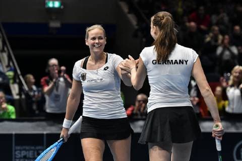 GER Fed Cup 2019 kick-off Germany vs Belarus in Braunschweig 10 02 2019 Volkswagen Halle Braunschweig GER Fed Cup 2019 kick-off Germany vs Belarus in Braunschweig in picture Anna Lena GroÌˆnefeld GER Porsche Team Mona Barthel GER Porsche Team Deutschland Deutschland bei der Absprache im Spiel gegen Victoria Azarenka BLR Lidziya Marozava BLR nph Mauelshagen nph00321