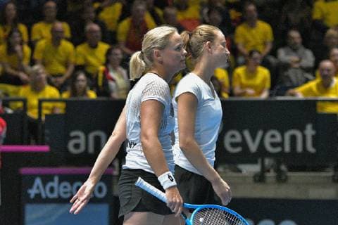 GER Fed Cup 2019 kick-off Germany vs Belarus in Braunschweig 10 02 2019 Volkswagen Halle Braunschweig GER Fed Cup 2019 kick-off Germany vs Belarus in Braunschweig in picture Anna Lena GroÌˆnefeld GER Porsche Team Germany Mona Barthel GER Porsche Team Germany on its way to the net to the winners Victoria Azarenka BLR Lidziya Marozava BLR nph Mauelshagen nph00321