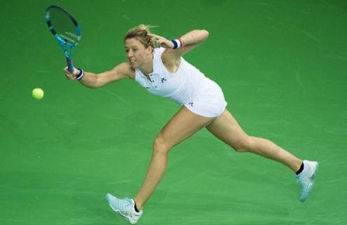 French Pauline Parmentier pictured during a doubles tennis match of Belgians Ysaline Bonaventure and Kirsten Flipkens versus French Fiona Ferro and Pauline Parmentier, the fifth and final rubber of the Fed Cup tennis meeting between Belgium and France, the quarter-finals of the World Group, Sunday 10 February 2019 in Liege. BENOITxDOPPAGNE  x05528209x
