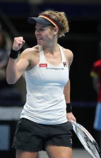 Laura Siegemund GER clenches her fist and fires herself at motivation