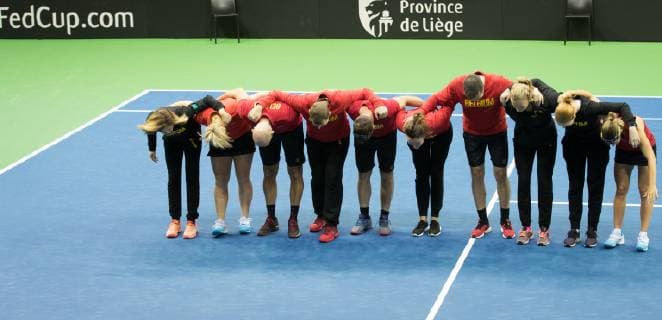Belgian players greet their fans after a doubles tennis match of Belgians Ysaline Bonaventure and Kirsten Flipkens versus French Fiona Ferro and Pauline Parmentier, the fifth and final rubber of the Fed Cup tennis meeting between Belgium and France, the quarter-finals of the World Group, Sunday 10 February 2019 in Liege. BENOITxDOPPAGNE  x05528214x