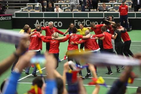 The Czech team lost to Romania 2-3 in the Fed Cup tennis tournament s 1st round after Czechs Barbora Krejcikova and Katerina Siniakova were defeated by Irina-Camelia Begu and Monica Niculescu 7-6, 4-6, 4-6 in the decisive doubles match in Ostrava, Czech Republic, February 10, 2019. Romanian Team celebrates a victory. (CTKxPhoto PetrxSznapka) CTKPhotoP201902100713701  SZN 74