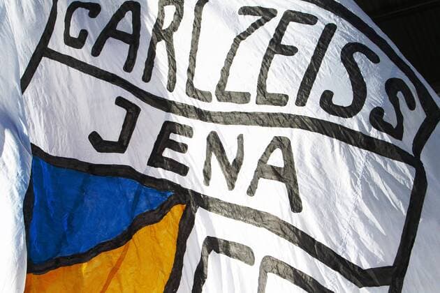 Jena 09 02 2019 Ernst Abbe Sportfeld Football Men 3 League 23 Matchday FC Carl Zeiss Jena vs Karlsruher SC 1 1 1 1 In picture Fan flag Flag with logo FC Carl Zeiss Jena Club flag