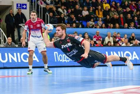 Centre back Barys Pukhouski (L) of HC Motor Zaporizhzhia and line player Johannes Golla of SG Flensburg-Handewitt are seen in action during the 2018 2019 VELUX EHF Champions League Group B match at the Yunist Palace of Sports, Zaporizhzhia, southeastern Ukraine, February 10, 2019. Ukrinform. EHF Champions League: Motor snatches 28-26 win over Flensburg at home  Copyright: xDmytroxSmolyenkox