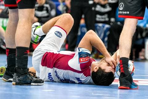A player of HC Motor Zaporizhzhia reacts to an injury during the 2018 2019 VELUX EHF Champions League Group B match against SG Flensburg-Handewitt at the Yunist Palace of Sports, Zaporizhzhia, southeastern Ukraine, February 10, 2019. Ukrinform. EHF Champions League: Motor snatches 28-26 win over Flensburg at home  Copyright: xDmytroxSmolyenkox