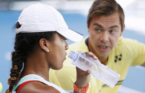 Tennis: Osaka parts ways with coach Bajin Photo shows Naomi Osaka (L) of Japan and her coach Sascha Bajin during the Australian Open tennis tournament in Melbourne in January 2019. Osaka announced on Feb. 11 that she will no longer be working together with him, two weeks after becoming the first player from Asia to top either the men s or women s singles rankings. 