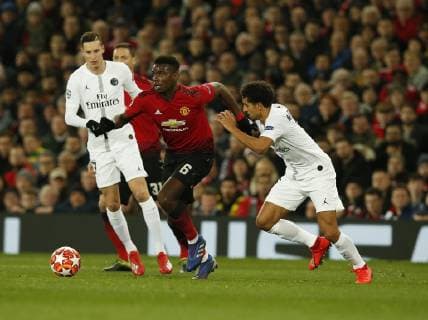 Paul Pogba of Manchester United ManU surges past Marcos Marquinhos of PSG during the UEFA Champions League Round of 16 First Leg match at the Old Trafford Stadium, Manchester. Picture date: 12th February 2019. Picture credit should read: Andrew Yates Sportimage EDITORIAL USE ONLY. No use with unauthorised audio, video, data, fixture lists, club league logos or live services. Online in-match use limited to 120 images, no video emulation. No use in betting, games or single club league player publications. _AY20310.JPG