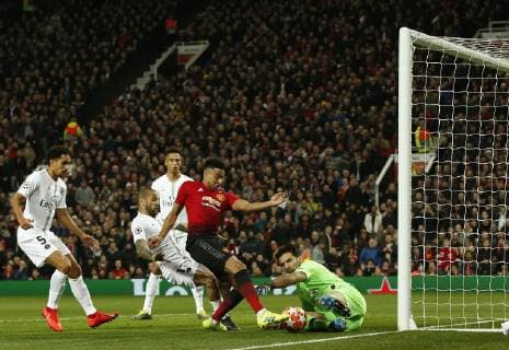 Jesse Lingard of Manchester United ManU has an effort saved by Gianluigi Buffon of PSG during the UEFA Champions League Round of 16 First Leg match at the Old Trafford Stadium, Manchester. Picture date: 12th February 2019. Picture credit should read: Andrew Yates Sportimage EDITORIAL USE ONLY. No use with unauthorised audio, video, data, fixture lists, club league logos or live services. Online in-match use limited to 120 images, no video emulation. No use in betting, games or single club league player publications. _AY13718.JPG