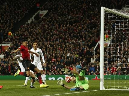 Jesse Lingard of Manchester United ManU has an effort saved by Gianluigi Buffon of PSG during the UEFA Champions League Round of 16 First Leg match at the Old Trafford Stadium, Manchester. Picture date: 12th February 2019. Picture credit should read: Andrew Yates Sportimage EDITORIAL USE ONLY. No use with unauthorised audio, video, data, fixture lists, club league logos or live services. Online in-match use limited to 120 images, no video emulation. No use in betting, games or single club league player publications. _AY13715.JPG