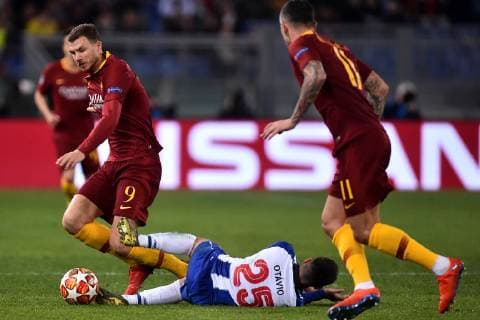 Edin Dzeko of AS Roma , Otavio of Porto Roma 12-2-2019 Stadio Olimpico Football Champions League 2018 2019 round of 16 1st leg AS Roma - Porto Foto Andrea Staccioli Insidefoto andreaxstaccioli
