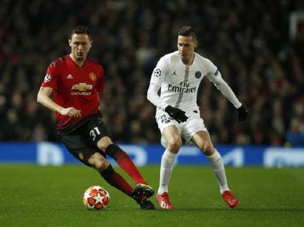 Nemanja Matic of Manchester United ManU turns away from Julian Draxler of PSG during the UEFA Champions League Round of 16 First Leg match at the Old Trafford Stadium, Manchester. Picture date: 12th February 2019. Picture credit should read: Andrew Yates Sportimage EDITORIAL USE ONLY. No use with unauthorised audio, video, data, fixture lists, club league logos or live services. Online in-match use limited to 120 images, no video emulation. No use in betting, games or single club league player publications. _AY20637.JPG