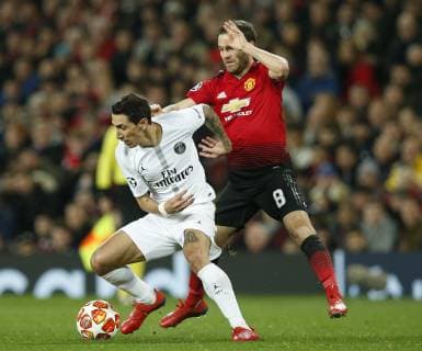 Angel Di Maria of PSG and Juan Mata of Manchester United ManU during the UEFA Champions League Round of 16 First Leg match at the Old Trafford Stadium, Manchester. Picture date: 12th February 2019. Picture credit should read: Andrew Yates Sportimage EDITORIAL USE ONLY. No use with unauthorised audio, video, data, fixture lists, club league logos or live services. Online in-match use limited to 120 images, no video emulation. No use in betting, games or single club league player publications. _AY20703.JPG