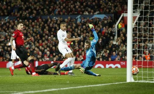 Sport Bilder des Tages Kylian Mbappe of PS scores the second goal during the UEFA Champions League Round of 16 First Leg match at the Old Trafford Stadium, Manchester. Picture date: 12th February 2019. Picture credit should read: Andrew Yates Sportimage EDITORIAL USE ONLY. No use with unauthorised audio, video, data, fixture lists, club league logos or live services. Online in-match use limited to 120 images, no video emulation. No use in betting, games or single club league player publications. _AY13965.JPG