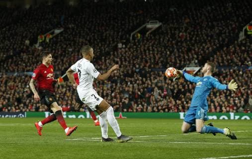 David De Gea of Manchester United ManU makes a save from Kylian Mbappe of PS during the UEFA Champions League Round of 16 First Leg match at the Old Trafford Stadium, Manchester. Picture date: 12th February 2019. Picture credit should read: Andrew Yates Sportimage EDITORIAL USE ONLY. No use with unauthorised audio, video, data, fixture lists, club league logos or live services. Online in-match use limited to 120 images, no video emulation. No use in betting, games or single club league player publications. SPI_073_AY_MANU_PSG.jpg