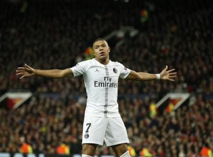 Kylian Mbappe of PS celebrates scoring the second goal during the UEFA Champions League Round of 16 First Leg match at the Old Trafford Stadium, Manchester. Picture date: 12th February 2019. Picture credit should read: Andrew Yates Sportimage EDITORIAL USE ONLY. No use with unauthorised audio, video, data, fixture lists, club league logos or live services. Online in-match use limited to 120 images, no video emulation. No use in betting, games or single club league player publications. SPI_074_AY_MANU_PSG.jpg