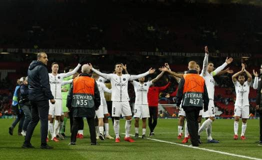 Sport Bilder des Tages PSG players attempt to celebrate with their fans during the UEFA Champions League Round of 16 First Leg match at the Old Trafford Stadium, Manchester. Picture date: 12th February 2019. Picture credit should read: Andrew Yates Sportimage EDITORIAL USE ONLY. No use with unauthorised audio, video, data, fixture lists, club league logos or live services. Online in-match use limited to 120 images, no video emulation. No use in betting, games or single club league player publications. _AY14232.JPG