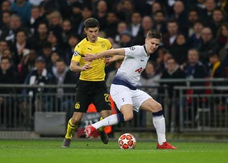 13th February 2019, Wembley Stadium, London England; UEFA Champions League football, Tottenham Hotspur versus Borussia Dortmund; Christian Pulisic of Borussia Dortmund challenges Juan Foyth of Tottenham Hotspur  ActionPlus12105152 JohnxPatrickxFletcher