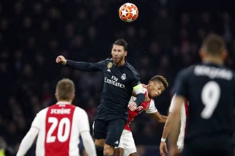 (l-r) Sergio Ramos of Real Madrid, David Neres of Ajax during the UEFA Champions League round of 16 match Ajax Amsterdam and Real Madrid at the Johan Cruijff Arena on February 13, 2019 in Amsterdam, The Netherlands UEFA Champions League 2018 2019 xVIxVIxImagesx xMauricexvanxSteenxIVx 13619434