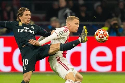 Amsterdam Netherlands 13 02 2019 UEFA Champions League 2018 19 Season Quarterfinal Ajax Amsterdam Real Madrid Luka Modric Real Madrid and Donny van de Beek Ajax Amsterdam in the duel battle for the ball DeFodi001