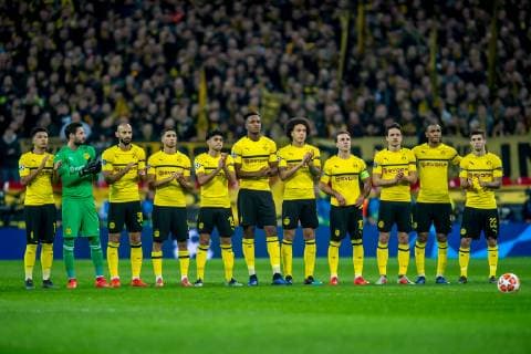 Borussia Dortmund squad during the minute of tribute to remember the tragic death of Emiliano Sala and his pilot during the UEFA Champions League round of 16 match between Tottenham Hotspur and Borussia Dortmund at Wembley Stadium, London, England on 13 February 2019. Copyright: xSalvioxCalabresex 22920002