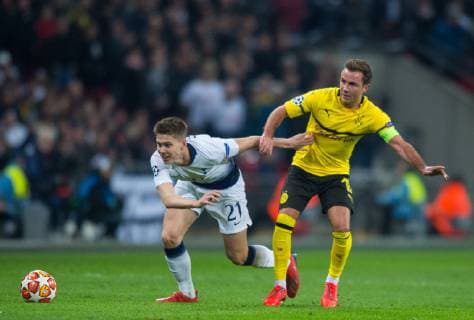 Tottenham s Juan Foyth and Borussia Dortmund Mario Gotze during the UEFA Champions League match between Tottenham Hotspur and Borussia Dortmund at Wembley Stadium, London, England on 13 February 2019. Copyright: xAndrewxAleksiejczukx PMI-2621-0003