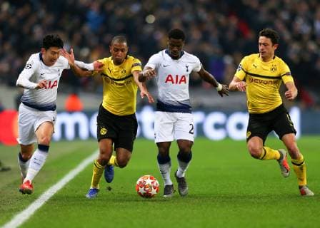 13th February 2019, Wembley Stadium, London England; UEFA Champions League football, Tottenham Hotspur versus Borussia Dortmund; Son Heung-Min of Tottenham Hotspur, Abdou Diallo of Borussia Dortmund, Serge Aurier of Tottenham Hotspur and Thomas Delaney of Borussia Dortmund compete for the ball  ActionPlus12105202 JohnxPatrickxFletcher