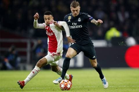 (l-r) Noussair Mazraoui of Ajax, Toni Kroos of Real Madrid during the UEFA Champions League round of 16 match Ajax Amsterdam and Real Madrid at the Johan Cruijff Arena on February 13, 2019 in Amsterdam, The Netherlands UEFA Champions League 2018 2019 xVIxVIxImagesx xMauricexvanxSteenxIVx 13620656