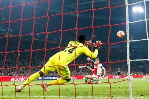 Ajax goalkeeper Andre Onana, Karim Benzema of Real Madrid, Matthijs de Ligt of Ajax during the UEFA Champions League round of 16 match Ajax Amsterdam and Real Madrid at the Johan Cruijff Arena on February 13, 2019 in Amsterdam, The Netherlands UEFA Champions League 2018 2019 xVIxVIxImagesx xTomxBodexMultimediaxIVx 13621006
