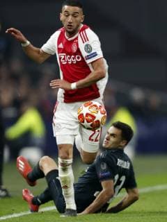 (l-r) Hakim Ziyech of Ajax, Sergio Reguilon of Real Madrid during the UEFA Champions League round of 16 match Ajax Amsterdam and Real Madrid at the Johan Cruijff Arena on February 13, 2019 in Amsterdam, The Netherlands UEFA Champions League 2018 2019 xVIxVIxImagesx xMauricexvanxSteenxIVx 13621058