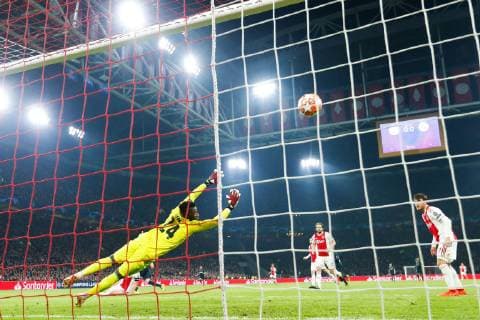 Karim Benzema of Real Madrid Ajax goalkeeper Andre Onana, Daley Blind of Ajax, Nico Tagliafico of Ajax during the UEFA Champions League round of 16 match Ajax Amsterdam and Real Madrid at the Johan Cruijff Arena on February 13, 2019 in Amsterdam, The Netherlands UEFA Champions League 2018 2019 xVIxVIxImagesx xTomxBodexMultimediaxIVx 13621184