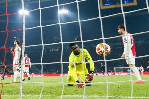 Daley Blind of Ajax, Ajax goalkeeper Andre Onana, Nico Tagliafico of Ajax during the UEFA Champions League round of 16 match Ajax Amsterdam and Real Madrid at the Johan Cruijff Arena on February 13, 2019 in Amsterdam, The Netherlands UEFA Champions League 2018 2019 xVIxVIxImagesx xTomxBodexMultimediaxIVx 13621444