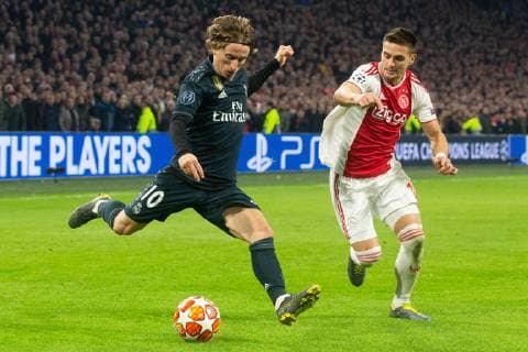 Luka Modric of Real Madrid, Dusan Tadic of Ajax during the UEFA Champions League round of 16 match Ajax Amsterdam and Real Madrid at the Johan Cruijff Arena on February 13, 2019 in Amsterdam, The Netherlands UEFA Champions League 2018 2019 xVIxVIxImagesx xTomxBodexMultimediaxIVx 13621478