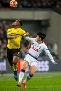 Son Heung-Min of Tottenham Hotspur and Dan-Axel Zagadou of Borussia Dortmund during the UEFA Champions League round of 16 match between Tottenham Hotspur and Borussia Dortmund at Wembley Stadium, London, England on 13 February 2019. Copyright: xSalvioxCalabresex 22920113