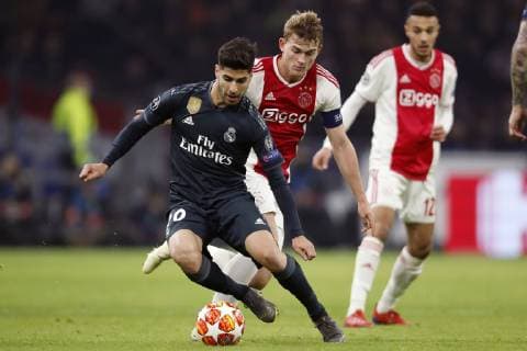(L-R) Marco Asensio of Real Madrid, Matthijs de Ligt of Ajax during the UEFA Champions League round of 16 match Ajax Amsterdam and Real Madrid at the Johan Cruijff Arena on February 13, 2019 in Amsterdam, The Netherlands UEFA Champions League 2018 2019 xVIxVIxImagesx xMauricexvanxSteenxIVx 13621921