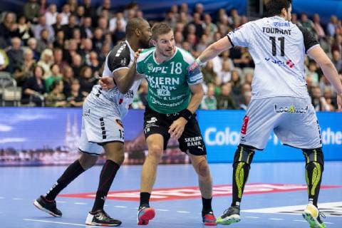 Bjarte Myrhol 18 from Skjern Handball midway between Rock Feliho 13 and Nicolas Tournat 11 from HBC Nantes during the Champions League group match in mens handball between Skjern Handball and HBC Nantes in Skjern Bank Arena in Skjern Sunday, February 17, 2019 Skjern,  Copyright: MadsxDalegaardx cop106 spdk20190217-174118-L