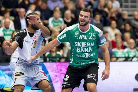 Eivind Tangen 25 from Skjern Handball th hold Nicolas Claire 7 from HBC Nantes during the Champions League group match in mens handball between Skjern Handball and HBC Nantes in Skjern Bank Arena in Skjern on Sunday 17 February 2019 Skjern,  Copyright: MadsxDalegaardx cop106 spdk20190217-185318-L
