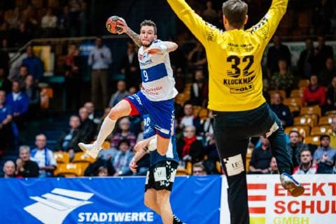 Handball 2 Bundesliga Men Season 2018 2019 Dessau Rosslauer HV 06 VfL Lübeck Schwartau Marek Vranco 9 Dessau Rosslauer HV 06 on Ball Dennis Klockmann 32 VfL Lübeck Schwartau during the season 2018 2019 in the Handball 2 Bundesliga Men between Dessau Rosslauer HV 06 and VfL Lübeck Schwartau in the Anhalt Arena on 17 February 2019 in Bauhausstadt Dessau Sachsen Anhalt Saxony Anhalt Germany Germany